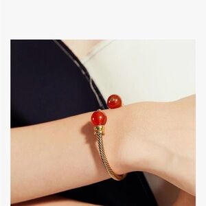 C. Pravano Gold and Red Women's Bracelet